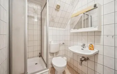 Ein Badezimmer in der Unterkunft Ferienwohnung Neuhermsdorf