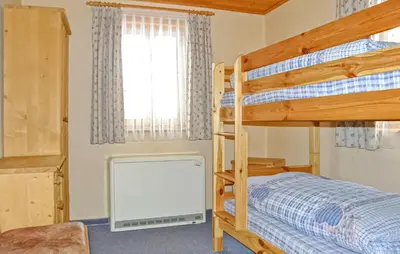 Ein Bett oder Betten in einem Zimmer der Unterkunft Ferienwohnung Neuhausen