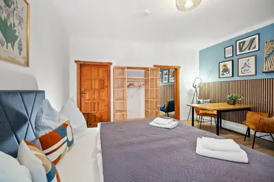 Ein Bett oder Betten in einem Zimmer der Unterkunft Noy´z in der belebten Neustadt