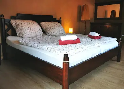 Ein Bett oder Betten in einem Zimmer der Unterkunft Ferienhaus Emilia