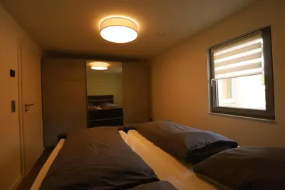 Ein Bett oder Betten in einem Zimmer der Unterkunft BestNest de