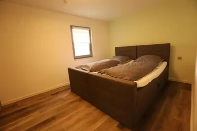 Ein Bett oder Betten in einem Zimmer der Unterkunft BestNest de