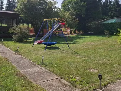 Ein Kinderspielbereich in der Unterkunft Zum Jagdsteinblick