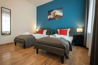 Ein Bett oder Betten in einem Zimmer der Unterkunft T21 - Apartment direkt im Zentrum mit Parkplatz