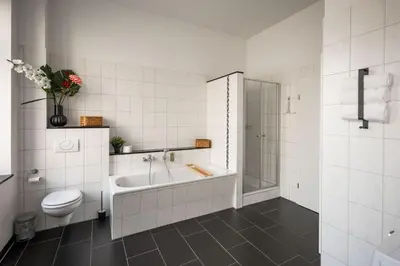 Ein Badezimmer in der Unterkunft T21 - Apartment direkt im Zentrum mit Parkplatz
