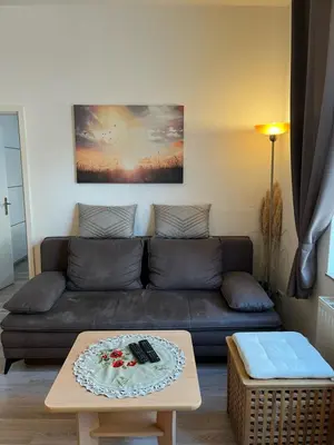 Ein Sitzbereich in der Unterkunft Gästewohnung zum Heiligen Grund