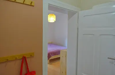 Ein Bett oder Betten in einem Zimmer der Unterkunft FEWO mit Sauna & Gartenblick