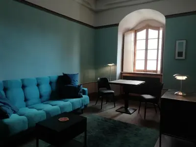 Ein Sitzbereich in der Unterkunft Mittelalterliches Domherrenhaus