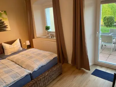 Ein Bett oder Betten in einem Zimmer der Unterkunft Landhaus Böhmer, Ferienwohnung Papststein