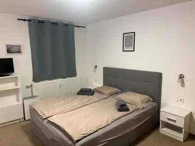 Ein Bett oder Betten in einem Zimmer der Unterkunft Ferienapartment 