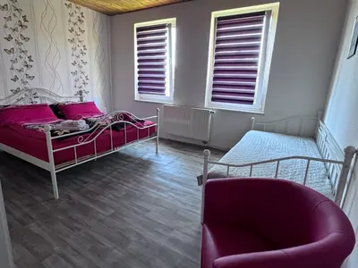 Ein Bett oder Betten in einem Zimmer der Unterkunft Ferienwohnung zwischen Dresden und Sächsischer Schweiz