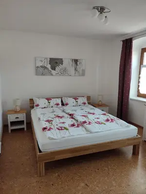 Ein Bett oder Betten in einem Zimmer der Unterkunft Strehla Markt