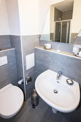 Ein Badezimmer in der Unterkunft Hotel 