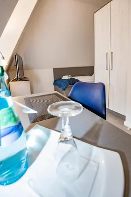 Ein Sitzbereich in der Unterkunft Hotel 