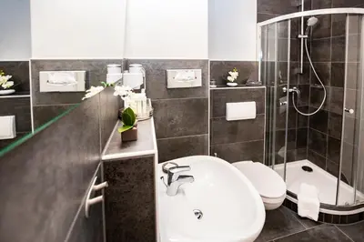 Ein Badezimmer in der Unterkunft Hotel 