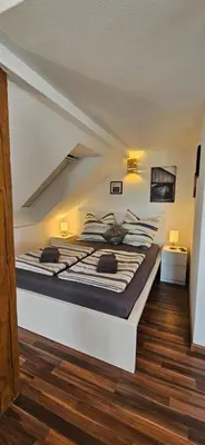 Ein Bett oder Betten in einem Zimmer der Unterkunft FeWo Wittig am Kulturbahnhof