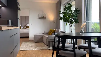 Ein Sitzbereich in der Unterkunft ARYVE Boutique-Apartment DRESDNER PENTHOUSE mit Dachterrasse - Tiefgaragenstellplätze - Design-Interieur