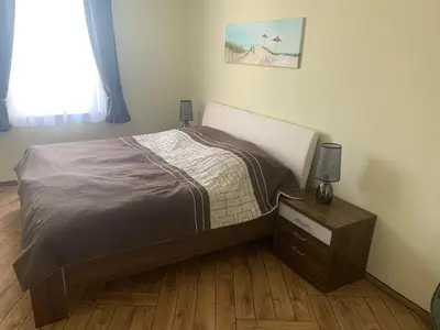 Ein Bett oder Betten in einem Zimmer der Unterkunft Ferienwohnung Zur fleißigen Biene