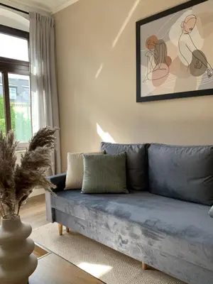 Ein Sitzbereich in der Unterkunft Stylisches Appartement im Jugendstil-Viertel