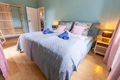 Ein Bett oder Betten in einem Zimmer der Unterkunft Dresden City Apartment