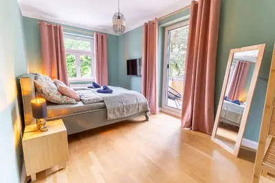 Ein Bett oder Betten in einem Zimmer der Unterkunft Dresden City Apartment