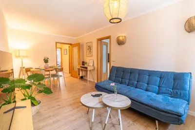 Ein Sitzbereich in der Unterkunft Ferienwohnung zur Burg
