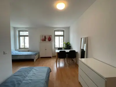Ein Bett oder Betten in einem Zimmer der Unterkunft Wohnglück Dresden