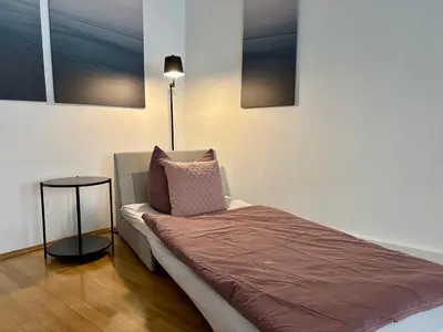 Ein Bett oder Betten in einem Zimmer der Unterkunft Gassenzauber