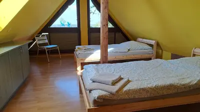 Ein Bett oder Betten in einem Zimmer der Unterkunft Ferienwohnung Zum alten Kutscher