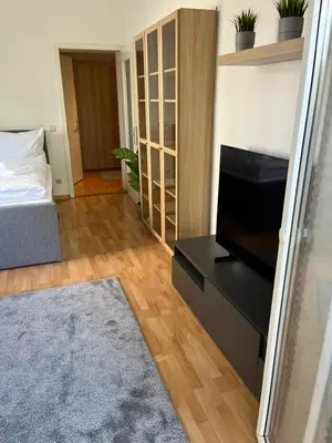 Ein Bett oder Betten in einem Zimmer der Unterkunft Apartment Leuben - Stylisch - Balkon - Küche
