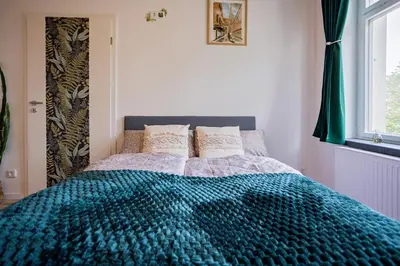 Ein Bett oder Betten in einem Zimmer der Unterkunft Boarding & Monteur Apartment CMTZ