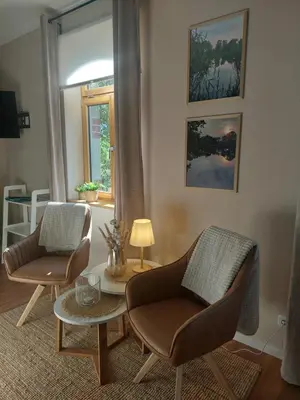 Ein Sitzbereich in der Unterkunft Ferienwohnung Am Bürgerteich 2