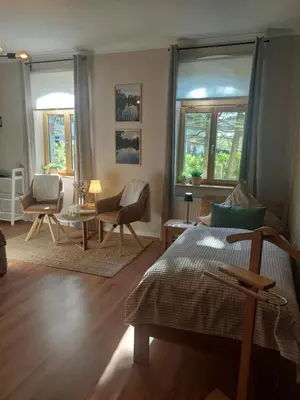 Ein Sitzbereich in der Unterkunft Ferienwohnung Am Bürgerteich 2