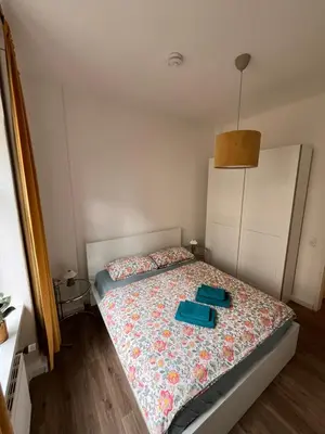Ein Bett oder Betten in einem Zimmer der Unterkunft Gäste-Appartements Morgensonne & Sonnenschein