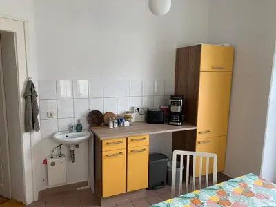 Küche/Küchenzeile in der Unterkunft Ferienwohnung am Tivoli