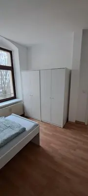 Ein Bett oder Betten in einem Zimmer der Unterkunft Moderne Monteurswohnung in Chemnitz