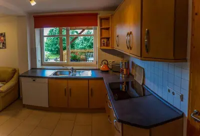 Küche/Küchenzeile in der Unterkunft Ferienwohnung SandSteinLand