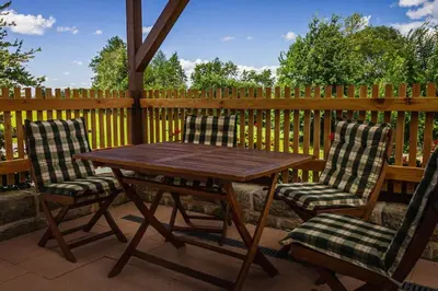 Ein Balkon oder eine Terrasse in der Unterkunft Ferienwohnung SandSteinLand