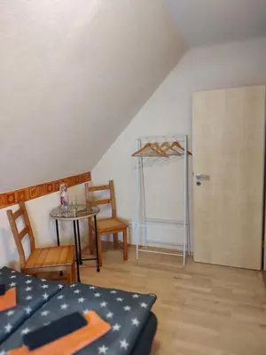 Ein Bett oder Betten in einem Zimmer der Unterkunft Dresden-Entspannung-Natur-trifft-2-Städte-am-Fluss