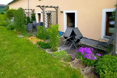 Ein Garten an der Unterkunft Ferienhof Näcke mit Flechtwerkstatt