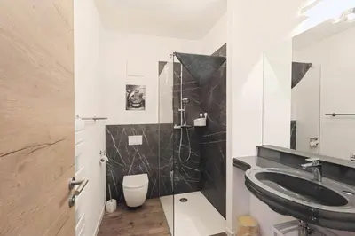 Ein Badezimmer in der Unterkunft Ferienquartier Forsthaus 2