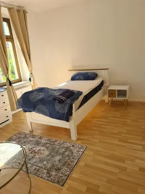 Ein Bett oder Betten in einem Zimmer der Unterkunft Chemnitz - Home Sweet Home