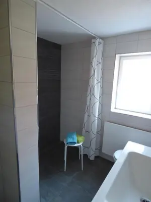 Ein Bett oder Betten in einem Zimmer der Unterkunft Ferienhaus Ilse