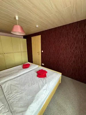 Ein Bett oder Betten in einem Zimmer der Unterkunft Ferienwohnung Hofmann