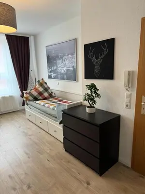 Ein Bett oder Betten in einem Zimmer der Unterkunft Apartment, 2P, WiFi, Küche, modern, ruhig, zentral