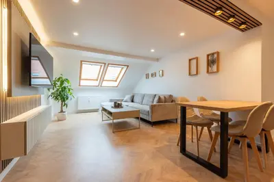 Ein Sitzbereich in der Unterkunft Moderne City Appartments