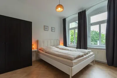 Ein Bett oder Betten in einem Zimmer der Unterkunft Moderne City Appartments