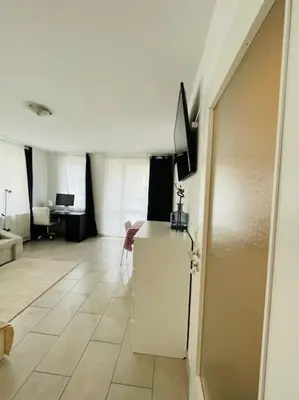 TV/Unterhaltungsangebot in der Unterkunft Studio-Apartment mit Balkon