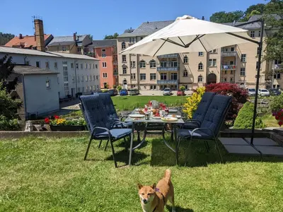 Ein Garten an der Unterkunft HW3B- Urlaubsmagie - großes Wohnzimmer & 2 Schlafzimmer