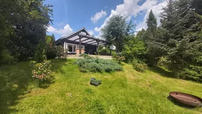 Ein Garten an der Unterkunft Ferienhaus zur Dorfbachklamm